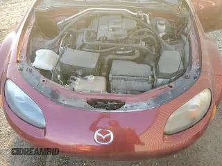 2007 Mazda MX-5 Miata Sport z VIN JM1NC25F970124896, wystawiony jako Copart lot #83624394 z przebiegiem 62 735 mil mil oraz Szkoda całkowita • Salvage title. Historia ofert i sprzedaży dostępna na DreamBid. Obrazek 11.