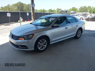 2016 Volkswagen Passat S with VIN 1VWAS7A38GC031521, listed as a IAAI auction lot 42069429 with 94,938 mi miles and . Bid and sale history available at DreamBid. Image 2.