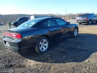 2014 Dodge Charger SE with VIN 2C3CDXBG5EH104852, listed as a IAAI auction lot 41866085 with 170,040 mi miles and . Bid and sale history available at carsss.com. Image 4.
