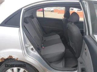 2009 Kia Rio LX with VIN KNADE243596544181, listed as a IAAI auction lot 41876733 with 200,216 mi miles. Bid and sale history available at carsss.com. Image 8.