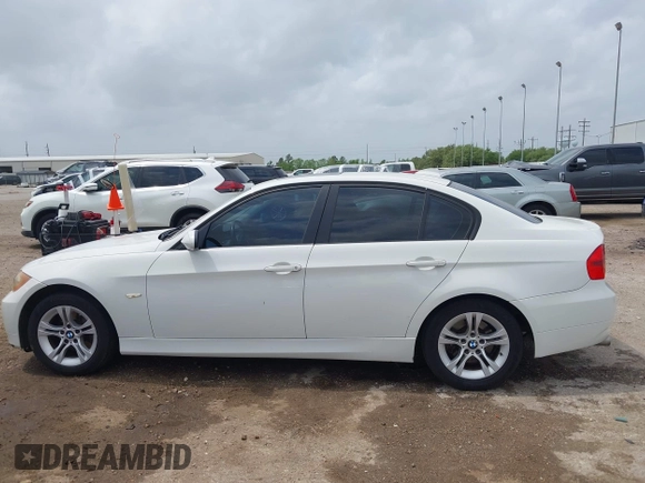 2008 BMW 3 Series 328i with VIN WBAVA37518NL53526, listed as a IAAI auction lot 41956298 with 208,586 mi miles and . Bid and sale history available at DreamBid. Image 14.