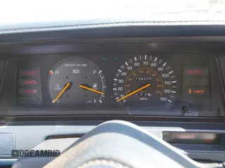 1990 Toyota Camry z VIN JT2SV21E9L0352085, wystawiony jako IAAI lot #42419588 z przebiegiem 138 425 mil mil oraz . Historia ofert i sprzedaży dostępna na DreamBid. Obrazek 7.