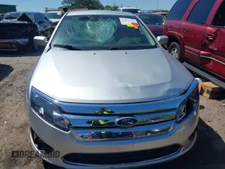 2012 Ford Fusion SE with VIN 3FAHP0HA6CR321255, listed as a IAAI auction lot 41971706 with 114,977 mi miles and . Bid and sale history available at DreamBid. Image 12.