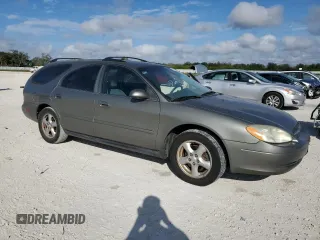 2003 Ford Taurus SE Standard with VIN 1FAFP58U33A259080, listed as a Copart auction lot 86819024 with 143,482 mi miles and Salvage Title. Bid and sale history available at carsss.com. Image 4.