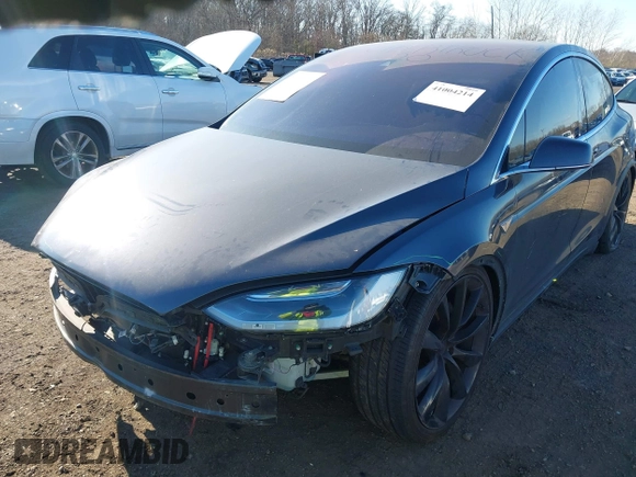 2016 Tesla Model X 70D z VIN 5YJXCAE28GF004461, wystawiony jako IAAI lot #41004214 z przebiegiem 158 962 mil mil oraz . Historia ofert i sprzedaży dostępna na DreamBid. Obrazek 19.