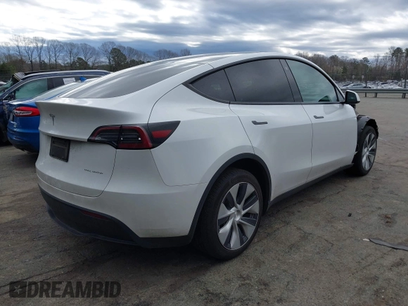 2023 Tesla Model Y Long Range z VIN 7SAYGDEE4PF621640, wystawiony jako IAAI lot #41796502 z przebiegiem 68 484 mil mil oraz . Historia ofert i sprzedaży dostępna na DreamBid. Obrazek 4.