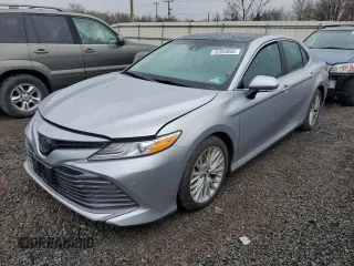 2018 Toyota Camry LE with VIN 4T1B11HK1JU075359, listed as a Copart auction lot 52953855 with 53,092 mi miles and Salvage title. Bid and sale history available at DreamBid. Image 1.