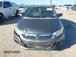 2012 Honda Insight LX with VIN JHMZE2H51CS003694, listed as a IAAI auction lot 41781384 with 154,685 mi miles and . Bid and sale history available at DreamBid. Image 12.