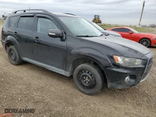 2011 Mitsubishi Outlander LS with VIN JA4JT3AX2BU606110, listed as a Copart auction lot 73539984 with 306,172 mi miles and Clean Title. Bid and sale history available at carsss.com. Image 4.