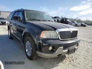 2004 Lincoln Navigator Luxury with VIN 5LMFU27R24LJ25870, listed as a Copart auction lot 76227474 with 147,854 mi miles and Salvage Title. Bid and sale history available at carsss.com. Image 4.