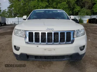 2011 Jeep Grand Cherokee Laredo z VIN 1J4RR4GG1BC506083, wystawiony jako Copart lot #58498295 z przebiegiem 122 847 mil mil oraz Czysty tytuł • Clean title. Historia ofert i sprzedaży dostępna na DreamBid. Obrazek 5.