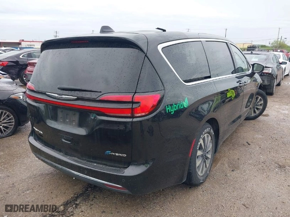2023 Chrysler Pacifica Hybrid Touring L with VIN 2C4RC1L71PR554435, listed as a IAAI auction lot 41901500 with 53,373 mi miles. Bid and sale history available at carsss.com. Image 4.