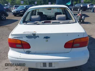 1998 Chevrolet Prizm Lsi z VIN 1Y1SK5281WZ420918, wystawiony jako IAAI lot #42360651 z przebiegiem 108 178 mil mil oraz . Historia ofert i sprzedaży dostępna na DreamBid. Obrazek 6.