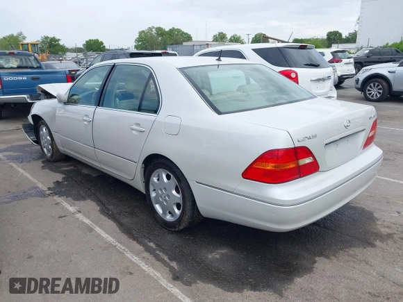 2001 Lexus LS 430 with VIN JTHBN30F110026221, listed as a IAAI auction lot 42022976 with 142,418 mi miles. Bid and sale history available at carsss.com. Image 3.