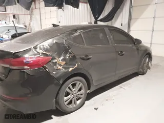 2018 Hyundai Elantra Value Edition with VIN KMHD84LF9JU545086, listed as a IAAI auction lot 41623845 with 128,973 mi miles. Bid and sale history available at carsss.com. Image 6.