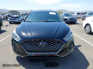 2019 Hyundai Sonata Sport with VIN 5NPE34AF2KH792374, listed as a IAAI auction lot 41987740 with 77,209 mi miles. Bid and sale history available at carsss.com. Image 12.