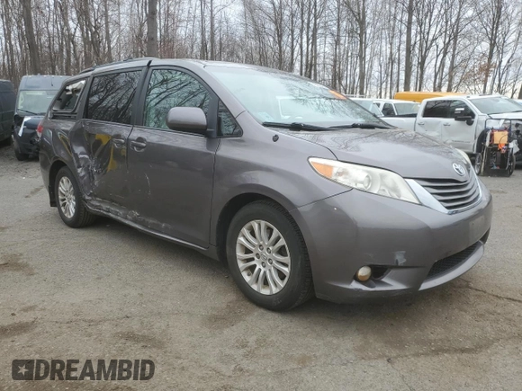 2014 Toyota Sienna XLE with VIN 5TDYK3DC1ES492724, listed as a Copart auction lot 51605245 with 112,079 mi miles and Salvage Title. Bid and sale history available at carsss.com. Image 4.