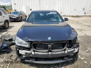 2014 BMW 7 Series ALPINA B7 xDrive with VIN WBAYF8C5XED653245, listed as a Copart auction lot 56010085 with 114,519 mi miles and Salvage title. Bid and sale history available at DreamBid. Image 5.