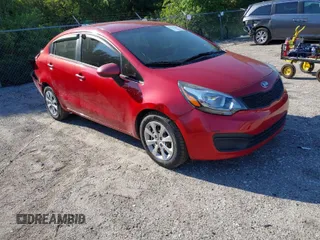 2014 Kia Rio LX with VIN KNADM4A35E6327324, listed as a IAAI auction lot 41893805 with 129,330 mi miles. Bid and sale history available at carsss.com. Image 1.