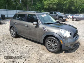 2014 MINI Countryman S with VIN WMWZC3C57EWP25099, listed as a Copart auction lot 62646555 with 153,059 mi miles and Salvage title. Bid and sale history available at DreamBid. Image 4.