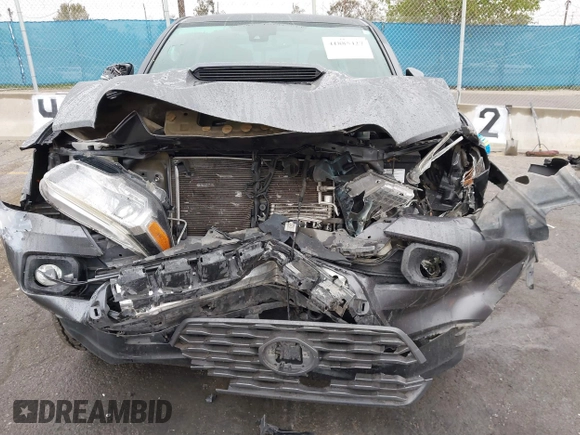 2020 Toyota Tacoma SR5 z VIN 3TMCZ5AN6LM323920, wystawiony jako IAAI lot #41885427 z przebiegiem 153 952 mil mil oraz . Historia ofert i sprzedaży dostępna na DreamBid. Obrazek 6.
