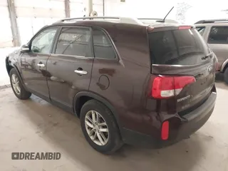 2014 Kia Sorento LX with VIN 5XYKTCA60EG450964, listed as a IAAI auction lot 42039186 with 191,426 mi miles and . Bid and sale history available at carsss.com. Image 3.