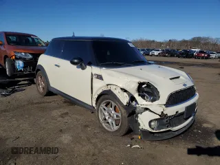 2007 MINI Hardtop S with VIN WMWMF73577TT86065, listed as a Copart auction lot 57262795 with 100,052 mi miles and Salvage Title. Bid and sale history available at DreamBid. Image 4.