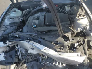 2011 BMW Z4 sDrive35is with VIN WBALM1C54BE633439, listed as a Copart auction lot 60327265 with 112,302 mi miles and Salvage title. Bid and sale history available at DreamBid. Image 11.
