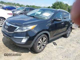 2013 Kia Sportage EX with VIN KNDPCCA21D7457355, listed as a IAAI auction lot 42694813 with 155,879 mi miles and . Bid and sale history available at DreamBid. Image 2.