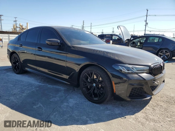 2021 BMW 5 Series 530e with VIN WBA13AG04MCF47235, listed as a Copart auction lot 69120474 with 74,779 mi miles and Salvage Title. Bid and sale history available at carsss.com. Image 4.
