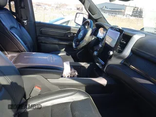 2021 Ram 1500 Limited with VIN 1C6SRFHT5MN548477, listed as a IAAI auction lot 41644894 with 51,429 mi miles and . Bid and sale history available at DreamBid. Image 5.