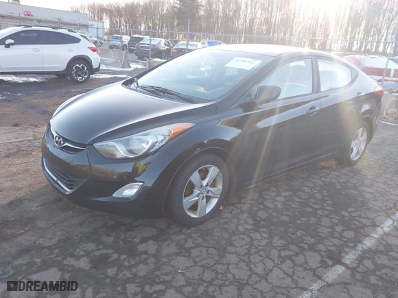 2012 Hyundai Elantra GLS with VIN KMHDH4AE8CU254219, listed as a IAAI auction lot 41206192 with 210,817 mi miles. Bid and sale history available at carsss.com. Image 2.