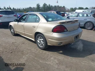 2004 Pontiac Grand Am SE1 z VIN 1G2NF52E34C244504, wystawiony jako IAAI lot #42070935 z przebiegiem 87 374 mil mil oraz . Historia ofert i sprzedaży dostępna na DreamBid. Obrazek 3.