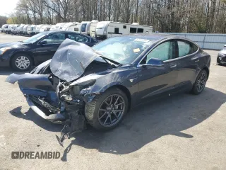 2018 Tesla Model 3 Long Range Battery with VIN 5YJ3E1EB6JF066148, listed as a Copart auction lot 52304285 with Not Provided miles and Salvage Title. Bid and sale history available at DreamBid. Image 1.