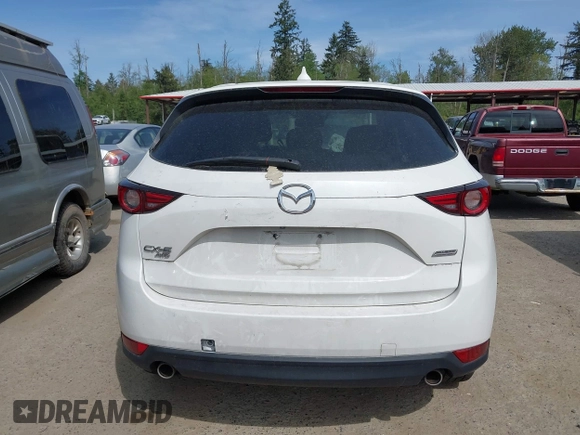 2018 Mazda CX-5 Grand Touring with VIN JM3KFBDM1J0309260, listed as a IAAI auction lot 42247237 with Not Provided miles and . Bid and sale history available at DreamBid. Image 16.