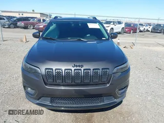 2019 Jeep Cherokee Latitude Plus with VIN 1C4PJLLB2KD438654, listed as a IAAI auction lot 41642098 with 69,678 mi miles and . Bid and sale history available at DreamBid. Image 12.