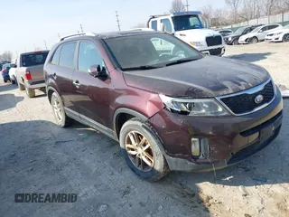 2014 Kia Sorento LX with VIN 5XYKT3A69EG499967, listed as a IAAI auction lot 41790052 with 198,101 mi miles and . Bid and sale history available at DreamBid. Image 1.
