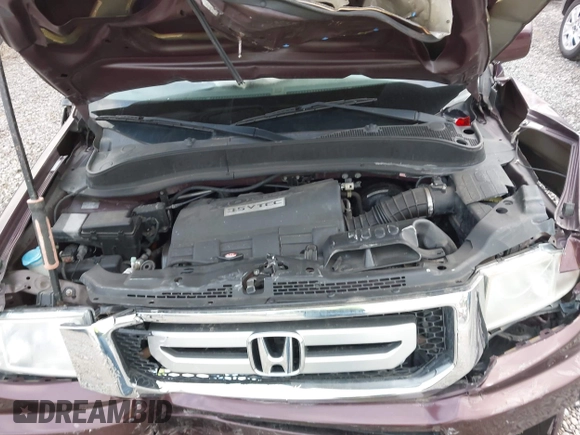 2010 Honda Ridgeline RTL with VIN 5FPYK1F57AB005602, listed as a IAAI auction lot 42208633 with 106,777 mi miles and . Bid and sale history available at DreamBid. Image 10.