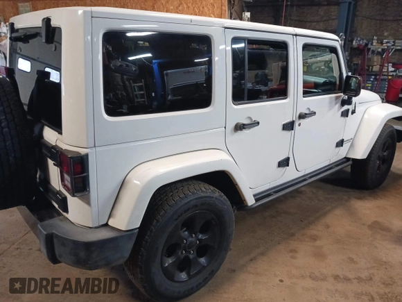 2015 Jeep Wrangler Unlimited Sahara with VIN 1C4BJWEG8FL696581, listed as a IAAI auction lot 41923093 with 193,421 mi miles and . Bid and sale history available at DreamBid. Image 4.
