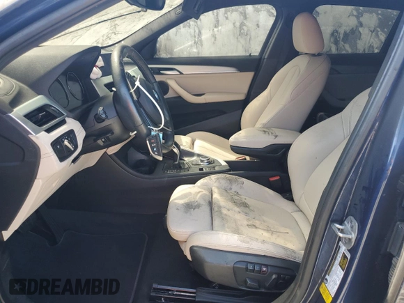 2021 BMW X2 sDrive28i with VIN WBXYH9C01M5T07944, listed as a Copart auction lot 73800944 with 0 mi miles and Salvage Title. Bid and sale history available at carsss.com. Image 7.