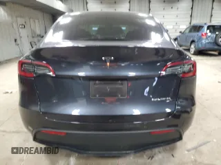 2024 Tesla Model Y Long Range with VIN 7SAYGDEE1RA254860, listed as a Copart auction lot 50750225 with 12,343 mi miles and Salvage Title. Bid and sale history available at DreamBid. Image 6.
