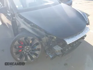 2022 Tesla Model Y Performance with VIN 7SAYGDEF0NF447541, listed as a IAAI auction lot 41762592 with 41,204 mi miles and . Bid and sale history available at DreamBid. Image 6.