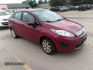2011 Ford Fiesta SE z VIN 3FADP4BJ1BM214267, wystawiony jako IAAI lot #42534730 z przebiegiem 173 140 mil mil oraz . Historia ofert i sprzedaży dostępna na DreamBid. Obrazek 1.