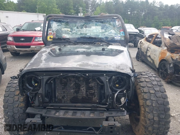 2008 Jeep Wrangler Unlimited Sahara with VIN 1J4GA59138L501621, listed as a IAAI auction lot 42245134 with 241,361 mi miles and . Bid and sale history available at DreamBid. Image 12.