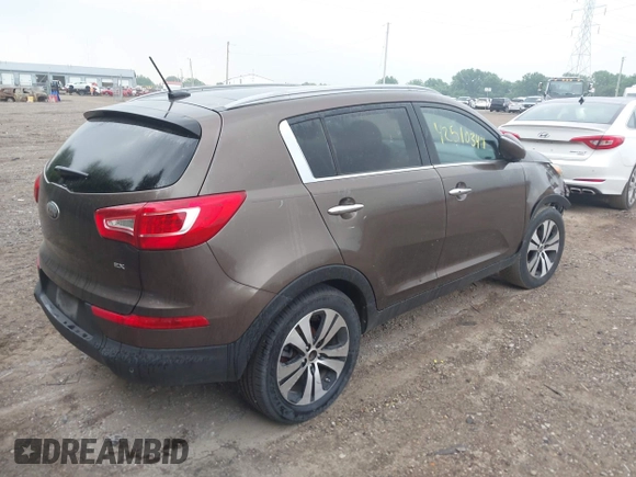 2013 Kia Sportage EX z VIN KNDPC3A28D7449821, wystawiony jako IAAI lot #42510347 z przebiegiem 194 084 mil mil oraz . Historia ofert i sprzedaży dostępna na DreamBid. Obrazek 4.