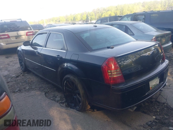 2006 Chrysler 300 C SRT8 with VIN 2C3LA73W66H249303, listed as a IAAI auction lot 42009645 with 137,242 mi miles. Bid and sale history available at carsss.com. Image 14.