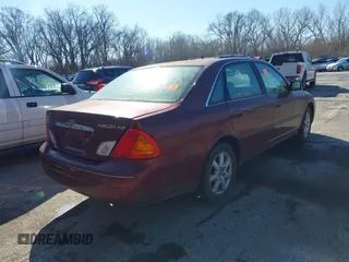 2002 Toyota Avalon XL with VIN 4T1BF28B82U216940, listed as a IAAI auction lot 41841874 with 298,982 mi miles and . Bid and sale history available at DreamBid. Image 4.