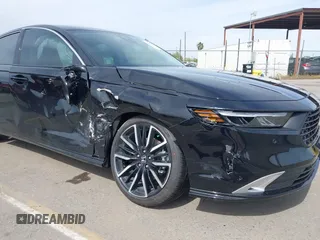 2025 Honda Accord Touring with VIN 1HGCY2F89SA027436, listed as a IAAI auction lot 41835197 with 390 mi miles and . Bid and sale history available at DreamBid. Image 6.