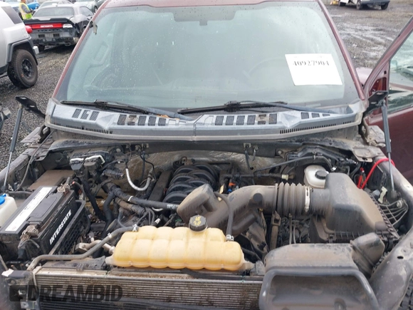 2015 Ford F-150 XLT with VIN 1FTEW1EF2FFA17900, listed as a IAAI auction lot 40927904 with 119,105 mi miles. Bid and sale history available at carsss.com. Image 10.
