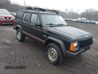 1995 Jeep Cherokee Sport with VIN 1J4FJ68S7SL572730, listed as a IAAI auction lot 41474520 with 189,907 mi miles. Bid and sale history available at carsss.com. Image 1.